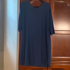 Navy knit sheath dress with cut-out in the back. Size small.